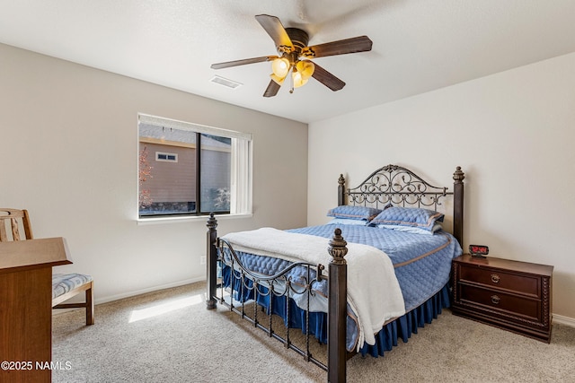 bedroom with baseboards, visible vents, a ceiling fan, and carpet flooring