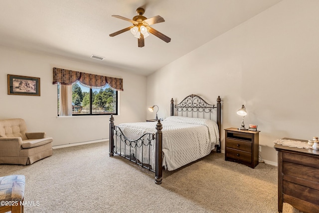bedroom featuring carpet, visible vents, a ceiling fan, and baseboards