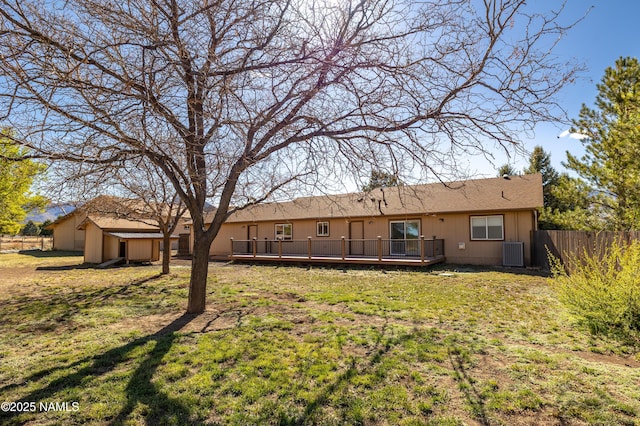 6120 E Treadway Trl, Flagstaff, AZ 86004 - back of house featuring cooling unit and a wooden deck