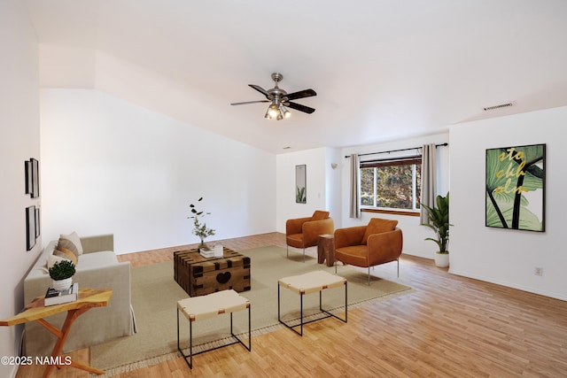 6120 E Treadway Trl, Flagstaff, AZ 86004 - living room with wood finished floors, a ceiling fan, and baseboards