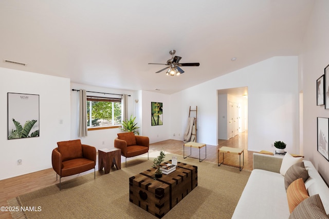 6120 E Treadway Trl, Flagstaff, AZ 86004 - living area featuring ceiling fan, vaulted ceiling, and wood finished floors
