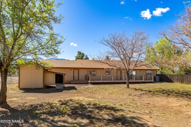 6120 E Treadway Trl, Flagstaff, AZ 86004 - rear view of house featuring fence, a deck, and central air condition unit