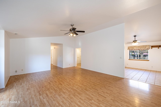 6120 E Treadway Trl, Flagstaff, AZ 86004 - empty room with a ceiling fan, light wood-style floors, and baseboards