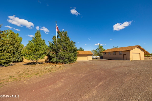 6120 E Treadway Trl, Flagstaff, AZ 86004 - view of front facade with a detached garage