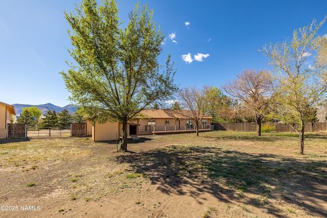6120 E Treadway Trl, Flagstaff, AZ 86004 - view of yard featuring a mountain view and fence