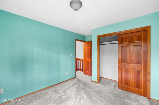 3130 Tina Ln, Flagstaff, AZ 86001 - unfurnished bedroom featuring carpet flooring and a closet