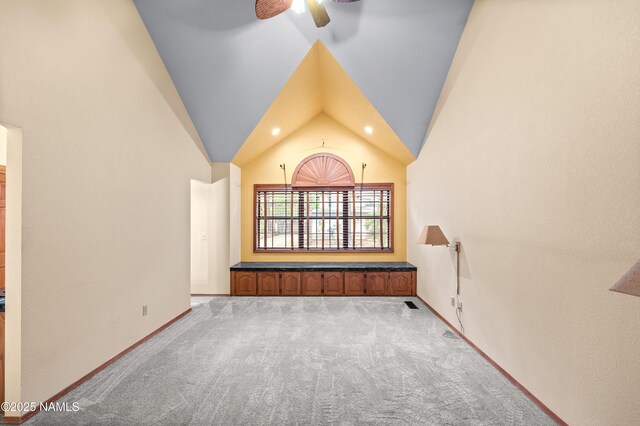 3130 Tina Ln, Flagstaff, AZ 86001 - spare room featuring carpet floors, ceiling fan, and lofted ceiling