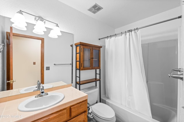 3130 Tina Ln, Flagstaff, AZ 86001 - bathroom featuring vanity and shower / bath combo with shower curtain