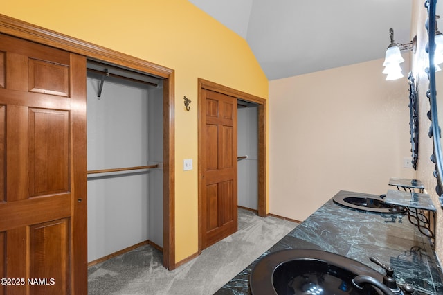 3130 Tina Ln, Flagstaff, AZ 86001 - bathroom with vaulted ceiling and double vanity