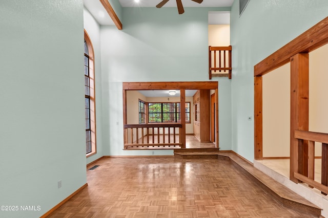 3130 Tina Ln, Flagstaff, AZ 86001 - unfurnished living room with a towering ceiling and a ceiling fan