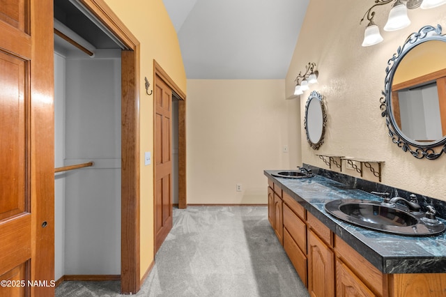 3130 Tina Ln, Flagstaff, AZ 86001 - full bathroom with lofted ceiling and double vanity