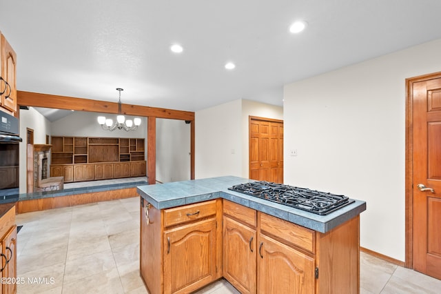 3130 Tina Ln, Flagstaff, AZ 86001 - kitchen with gas stovetop, recessed lighting, light tile patterned floors, vaulted ceiling, and a chandelier