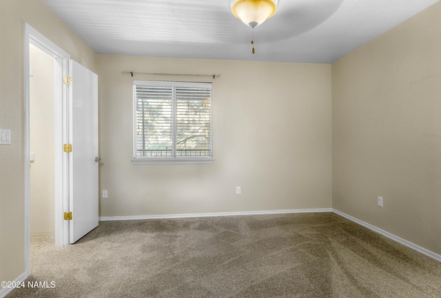 empty room with carpet floors