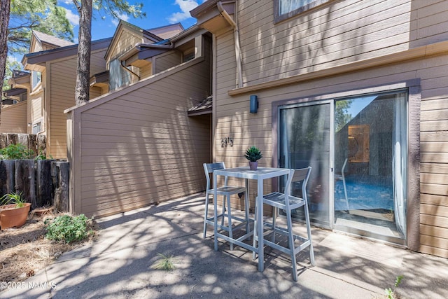 2315 N Whispering Pines Way, Flagstaff, AZ 86004 - view of patio / terrace with outdoor dining space and fence