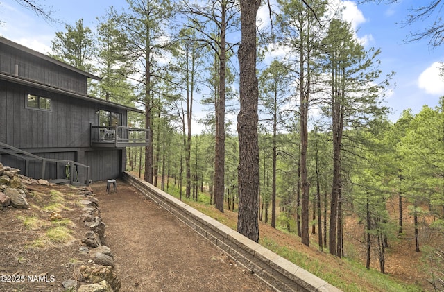 2929 Kletha Trl, Flagstaff, AZ 86005 - view of yard featuring driveway and a view of trees