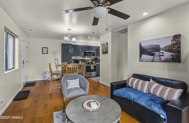 2929 Kletha Trl, Flagstaff, AZ 86005 - living room featuring wood finished floors, a ceiling fan, recessed lighting, and baseboards