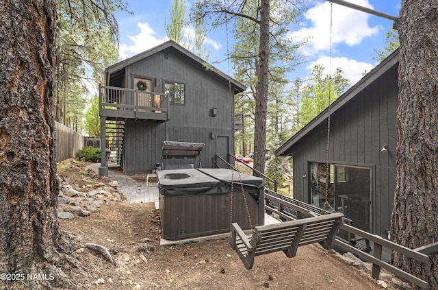 2929 Kletha Trl, Flagstaff, AZ 86005 - back of property featuring a hot tub and stairway
