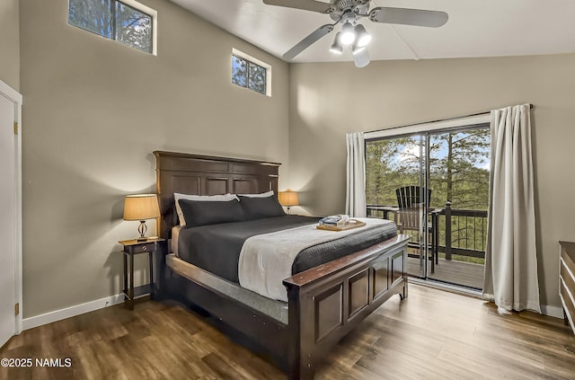 2929 Kletha Trl, Flagstaff, AZ 86005 - bedroom featuring access to outside, wood finished floors, baseboards, and a ceiling fan