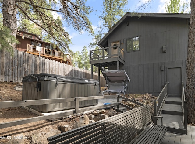 2929 Kletha Trl, Flagstaff, AZ 86005 - view of patio / terrace featuring a hot tub and a balcony