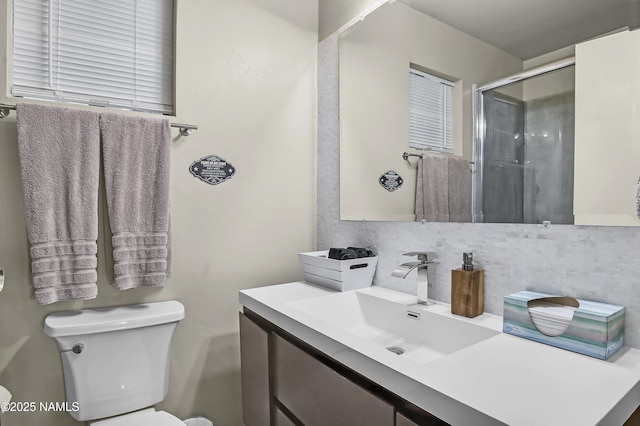 2929 Kletha Trl, Flagstaff, AZ 86005 - full bath featuring toilet, tasteful backsplash, vanity, and an enclosed shower