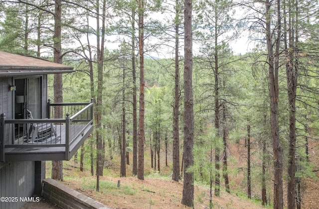 2929 Kletha Trl, Flagstaff, AZ 86005 - view of yard with a wooded view and a deck