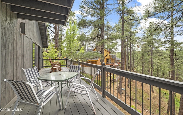 2929 Kletha Trl, Flagstaff, AZ 86005 - wooden terrace featuring outdoor dining area