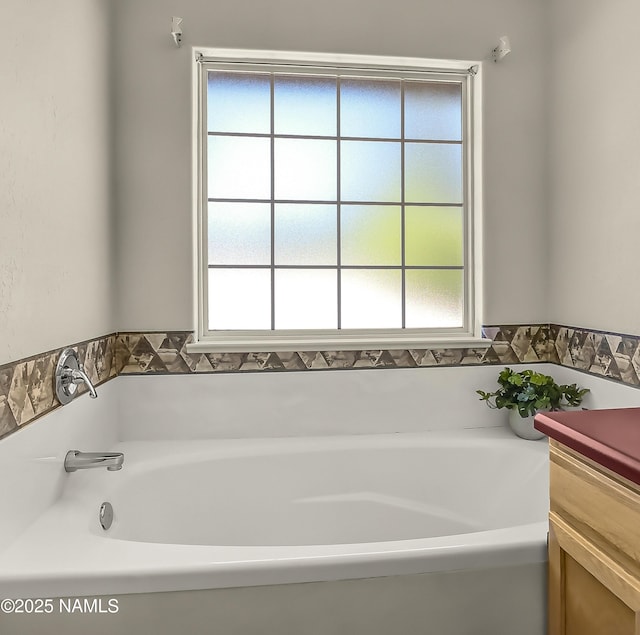 8210 Winchester Dr, Flagstaff, AZ 86004 - bathroom featuring plenty of natural light and a garden tub