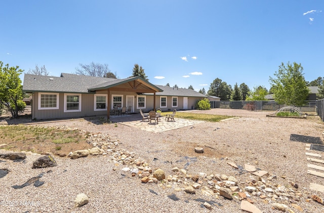 8210 Winchester Dr, Flagstaff, AZ 86004 - rear view of property with fence and a patio