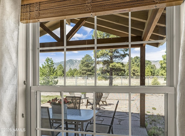 8210 Winchester Dr, Flagstaff, AZ 86004 - sunroom featuring a mountain view and lofted ceiling