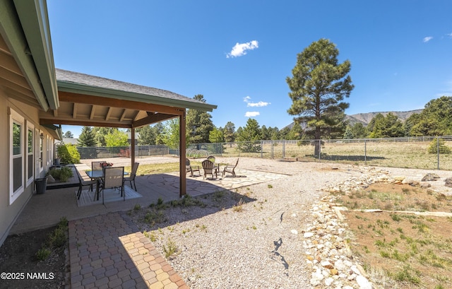 8210 Winchester Dr, Flagstaff, AZ 86004 - fenced backyard featuring a patio area and a mountain view