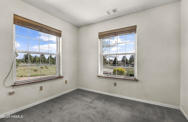 8210 Winchester Dr, Flagstaff, AZ 86004 - unfurnished room with baseboards and dark carpet