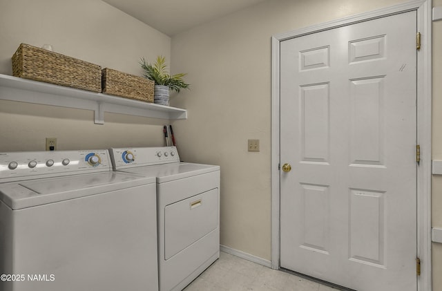 8210 Winchester Dr, Flagstaff, AZ 86004 - washroom with washing machine and clothes dryer and baseboards