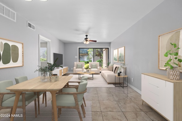 dining room with ceiling fan, plenty of natural light, and light tile patterned flooring