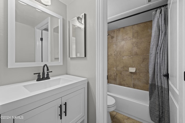 full bathroom with toilet, vanity, and shower / tub combo