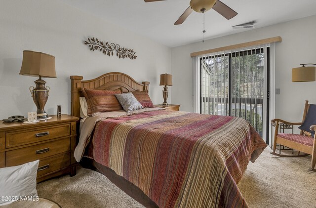 carpeted bedroom with ceiling fan, visible vents, and access to exterior