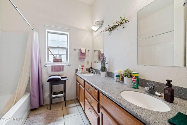 bathroom with shower / tub combo with curtain, tile patterned flooring, and vanity