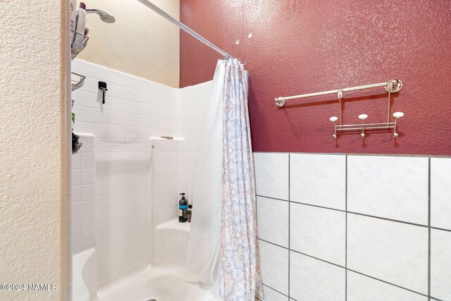 bathroom featuring walk in shower