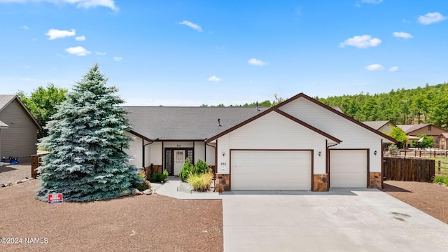 view of front of home with a garage