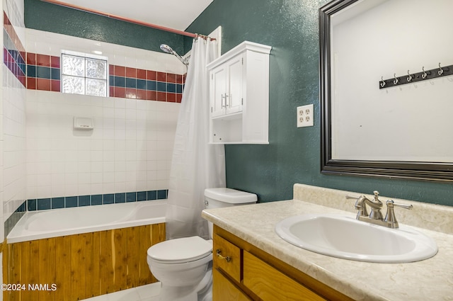 full bathroom featuring vanity, toilet, and shower / bathtub combination with curtain