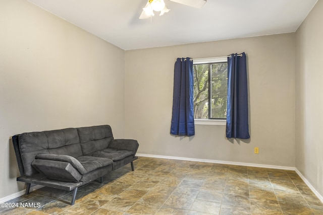 living area featuring ceiling fan