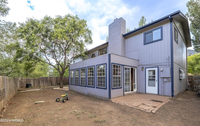 rear view of house featuring a patio area