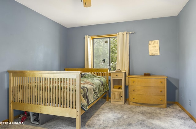 bedroom with carpet and ceiling fan