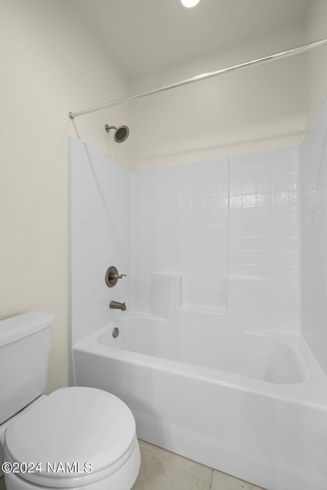 3008 E Cold Springs Trl, Flagstaff, AZ 86004 - full bathroom with washtub / shower combination, tile patterned flooring, and toilet