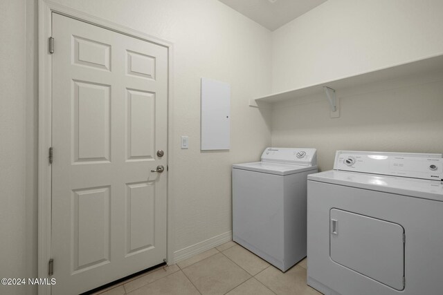 3008 E Cold Springs Trl, Flagstaff, AZ 86004 - clothes washing area featuring baseboards, washer and dryer, laundry area, and light tile patterned floors