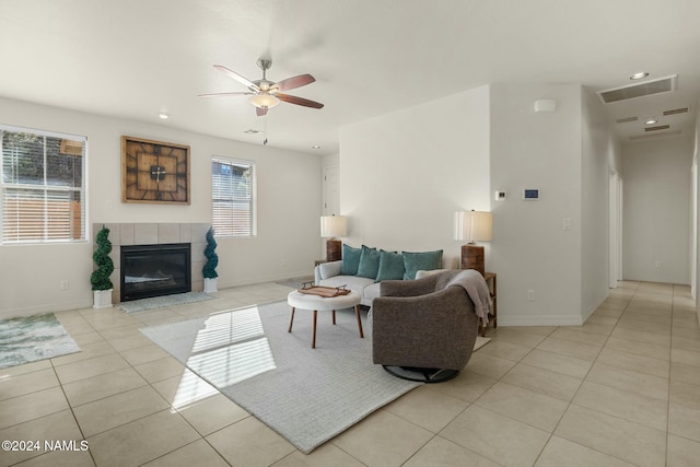 3008 E Cold Springs Trl, Flagstaff, AZ 86004 - living area featuring visible vents, a ceiling fan, baseboards, and light tile patterned floors
