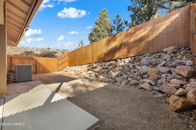 3008 E Cold Springs Trl, Flagstaff, AZ 86004 - view of yard with a patio area, a fenced backyard, and cooling unit