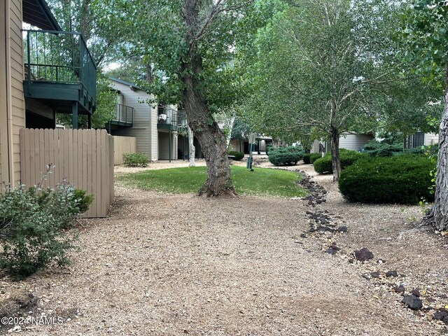 3200 S Litzler Dr Unit 8, Flagstaff, AZ 86005 - view of yard with a balcony