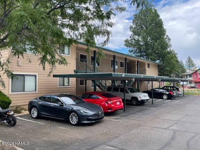 3200 S Litzler Dr Unit 8, Flagstaff, AZ 86005 - view of property featuring covered parking and stairs