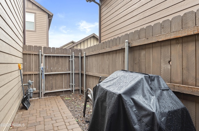 view of patio / terrace with fence and area for grilling