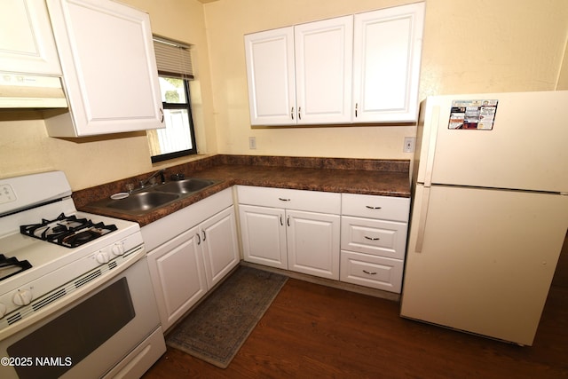 417, 429 W Sheridan Ave, Williams, AZ 86046 - kitchen featuring white appliances, under cabinet range hood, a sink, and white cabinets